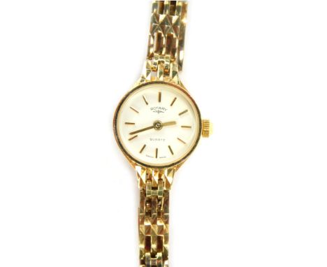 A Rotary 9ct gold lady's wristwatch, with a white coloured dial, and two bar bracelet, 10.7g all in, boxed. 