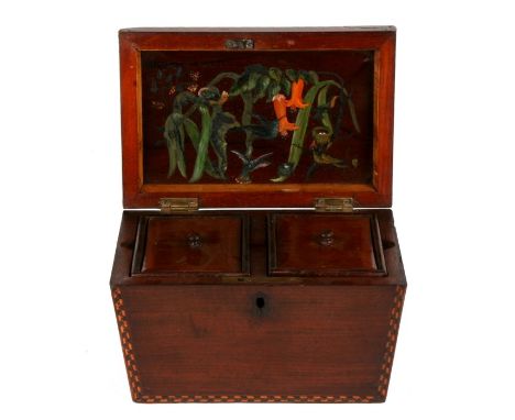 An early 19th century Sinhalese inlaid sarcophagus shaped two division tea caddy, opening to reveal an exotic bird painted in
