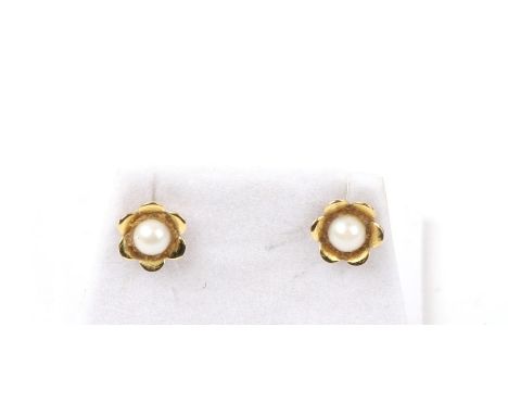 A pair of 9ct gold and pearl flower earrings.