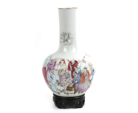 A Chinese bottle vase decorated with Immortals and animals, red seal mark to underside, on a pierced hardwood stand, 31cms (1