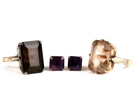 A 14ct gold dress ring set with a large rectangular smoky quartz; together with another similar, both approx UK size 'M' and 