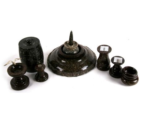 A collection of Cornish serpentine items to include desk sundials and a compass.