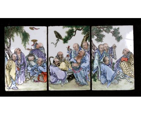 Three Chinese finely painted ceramic plaques depicting monks and animals, 13 by 21cms (5.2 by 8.25ins) (3).Condition ReportMi