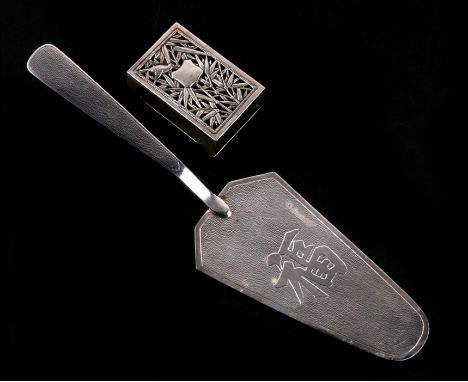 A waikee Hong Kong sterling silver serving slice, and a Chinese white metal pierced bamboo pattern match box cover.