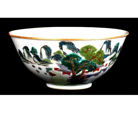 A Chinese famille verte bowl decorated with a landscape, blue seal mark to the underside, 17cms (6.25ins) diameter.Condition 