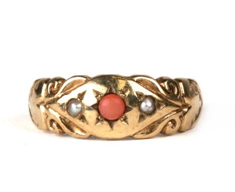 An Edwardian 9ct gold coral and pearl set gypsy ring, approx UK size 'O'.