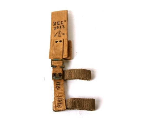 An unissued 08 Pattern bayonet frog with helve strap and carrier. Marked to the reverse of the helve strap with the War Depar