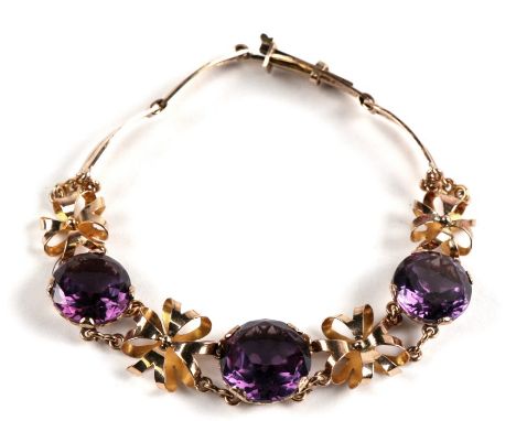 A 14ct rose gold amethyst set bracelet Condition Report12.9g. Clasp in good working condition and it is marked 14ct.