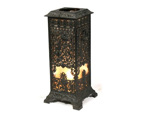 A Victorian pierced cast iron stove (converted to a lamp), 69cm (27ins) high. 