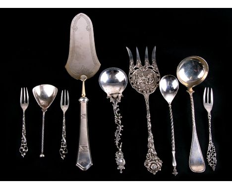 A quantity of Dutch silver items, including sauce ladle, serving fork etc.