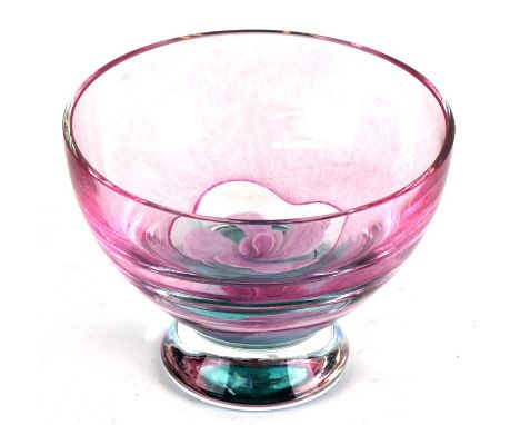 A Caithness footed glass bowl with central flower decoration, 16cms (6.25ins) diameter.