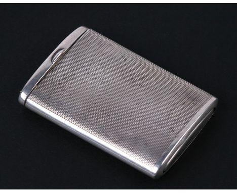 A silver drawer style patent vesta case with all over engine turning, import hallmarks for London 1927