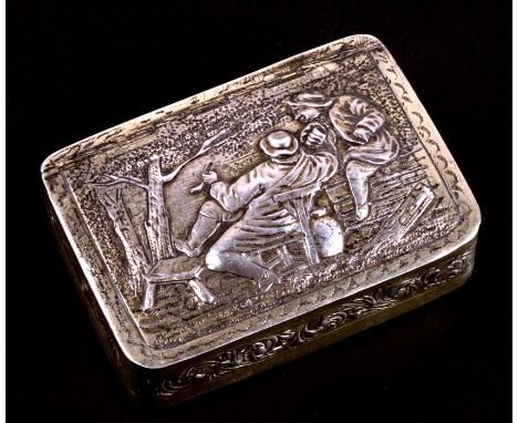 A large George III silver gilt snuff box, the lid cast with the image of peasants smoking under a tree. Birmingham 1810 with 