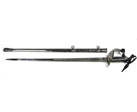 A Royal Tank Regiment officers named presentation dress sword with black leather acorn dress knot in its plated steel  scabba
