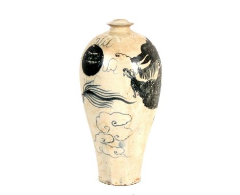 A Chinese Cizhou type Meiping vase decorated with a dragon chasing a flaming pearl amongst clouds, 34cms (13.5ins) high.Condi