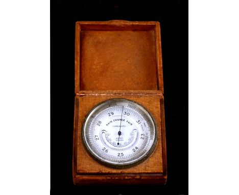An Asprey pigskin cased combination compensated barometer, altimeter and thermometer, marked Asprey to the case and the dial.