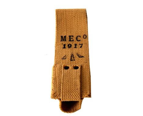 An unissued 08 Pattern bayonet frog with helve strap. Marked to the reverse with the War Department arrow and MECo 1917