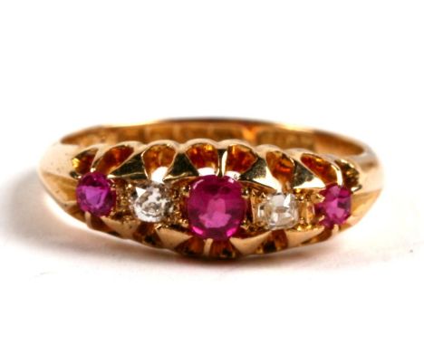 An early 20th century 18ct gold, ruby and diamond five stone ring, Birmingham 1911, 3.9g. Approx. UK size N. 