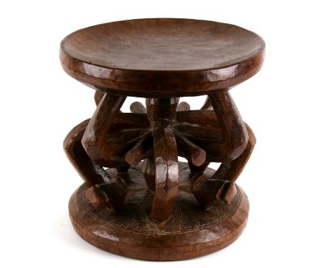 Africa/ Tribal Art. An Ozo Society Title stool of intricate carved shape and form. Igbo, Awka region of Nigeria 33cm(13.25 in
