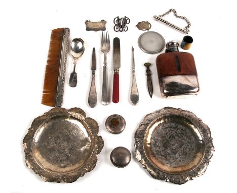 A pair of Eastern white metal dishes; together with a silver backed comb; a silver plated hip flask and other items.