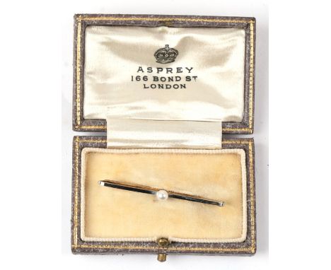 An early 20th century boxed Asprey 15ct gold and platinum bar brooch set with a single pearl 
