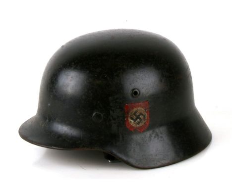 A WW2 Third Reich Waffen SS combat helmet with double decals, liner and chin strap. Makers mark ET64 (for Eisenhuttenwerke - 