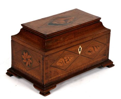 A Georgian inlaid mahogany three-division tea caddy with shell decoration, 27cms (10.5ins) wide.