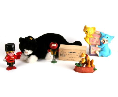 A Steiff black and white cat; together with a boxed Magic Roundabout 'Zebulon' (Zebedee); an early plastic Tom &amp; Jerry ni