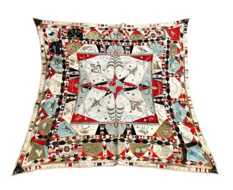 An unusual 19th century military needlework wall hanging, having over fifty individual panels including cap badges, music and