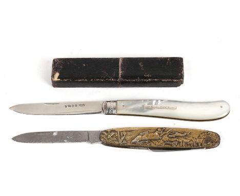 A Victorian silver and mother of pearl boxed fruit knife, Sheffield 1877; together with a brass cased fruit knife decorated w