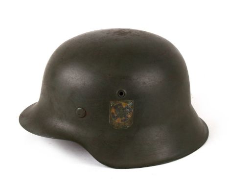 From a private collection, an M1942 Third Reich German helmet with Sauerland decal. Production number stamped on the undersid