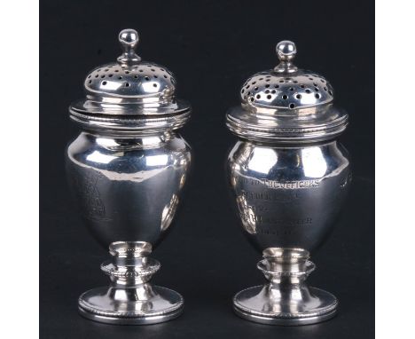 Military interest silver salt and pepper castors presented to the First Norfolk Regiment, by Lieutenant H. Lancaster. Decembe