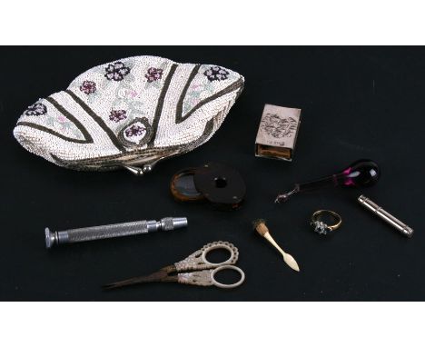 A group of items including a pair of Palais Royal mother of pearl scissors; a silver Art Nouveau match case; an early 20th ce