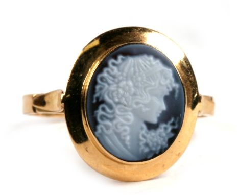 An Italian 18ct gold ring set with blue &amp; white stone cameo portrait, 2.9g. Approx. UK size Q. 