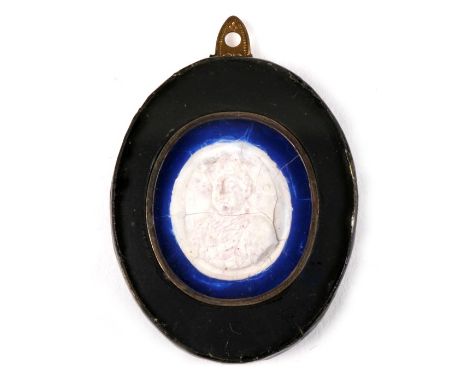 A wax plaster and glass portrait plaque or pendant of Charles XII of Sweden. 6cm 2.5 inches.