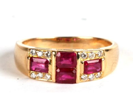 An 18ct gold, ruby and diamond ring, 4.9g. Approx. UK size M. 