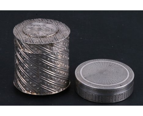 Two small continental silver boxes. A French one with ornate engine turned decoration, and a Dutch one with all over stars an