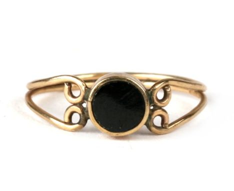 A 9ct gold black onyx set ring, approx UK size 'K'.