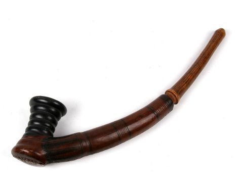 Africa/ Tribal Art.  A pipe with black clay bowl of ring form and having a tooled leather body and wooden mouth section. Poss