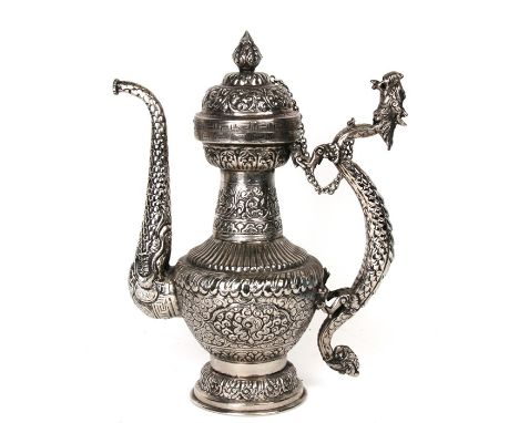 A large Chinese silver coloured metal wine pot with dragon handle. 35cm 13.75ins high.Condition ReportGood condition with no 