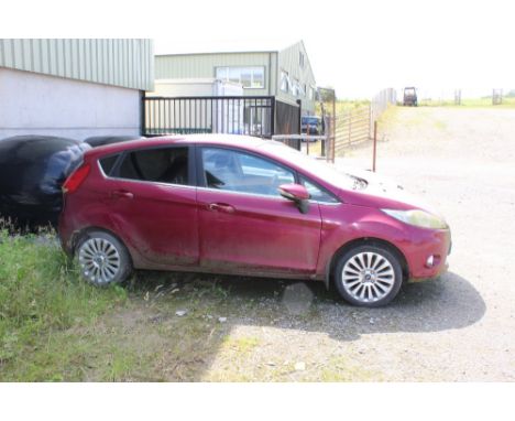 A Ford Fiesta Titanium 120, Red, petrol, registration number NX59 HGD. Mileage approx 73,000.  