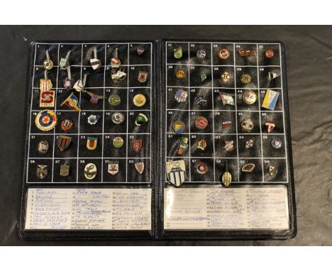 An indexed album of 60 European football supporters enamel badges of West German, Yugoslavian, Polish and other teams, includ