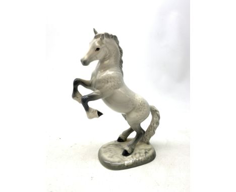 A Beswick figurine, modelled as a rearing Welsh Cob, upon a naturalistic base, with printed and impressed marks to base, no 1