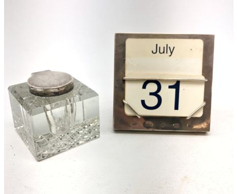 A modern silver mounted desk calendar, of plain square form with easel style support verso, hallmarked Carr's of Sheffield Lt