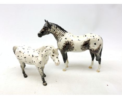 A Beswick figurine, modelled as a spotted Appaloosa pony, together with a further Beswick figurine modelled as an Appaloosa S