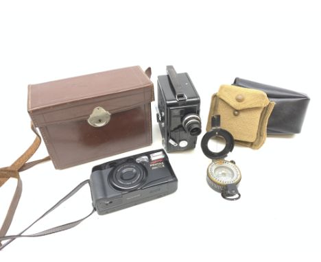 A WWII mark III compass by T G Co Ltd, together with a cased Dekko cine camera, and a Pentax zoom 70-X camera.  Condition Rep