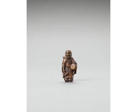   A WOOD NETSUKE OF ONI NEMBUTSU  Signed  Japan, Meiji period (1868-1912)    A classic depiction of the repentant oni standin