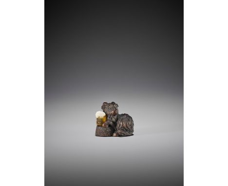   ALEXANDER DERKACHENKO: A BOXWOOD NETSUKE OF A GOAT WITH BEER (KOZEL)  By Alexander Derkachenko  Ukraine, 2019    This work 
