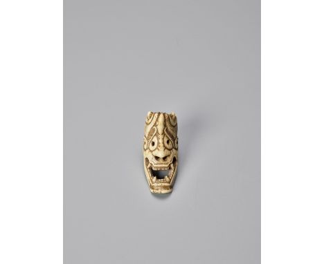   A BONE NETSUKE OF A HANNYA MASK  Unsigned  Japan, 19th century, Edo period (1615-1868)    This bone netsuke depicts Hannya.