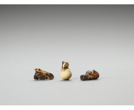   TWO IVORY AND ONE BONE NETSUKE OF RATS  Unsigned  Japan, Meiji period (1868-1912)    A bone netsuke of a small rat gnawing 